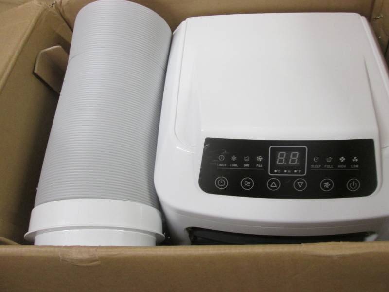 lot 48 image: Montgomery Ward Portable Air Condit...
