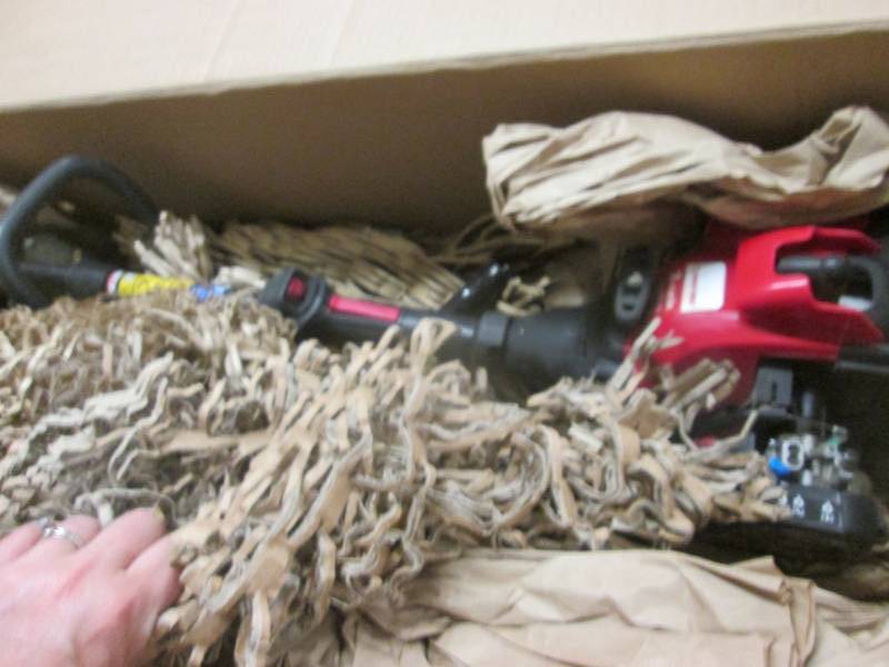 lot 78 image: Troy Bilt 2 Cycle Trimmer open box ...