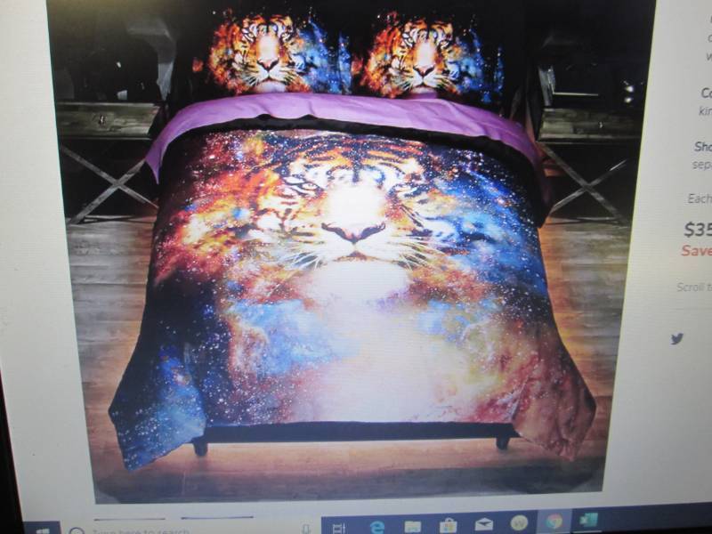 lot 123 image: Cosmic Tiger Comforter Set open box...