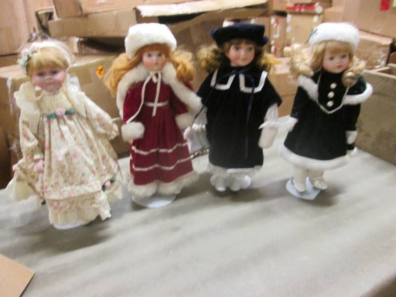 lot 143 image: Lot of 4 Collectible Dolls with Sta...