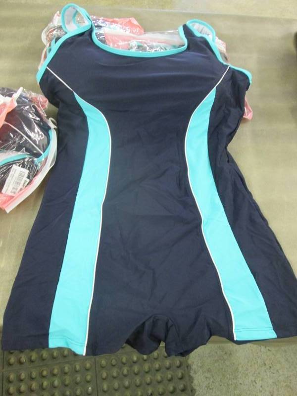 lot 201 image: Lot of 4- Size 46 Candies One Piece...