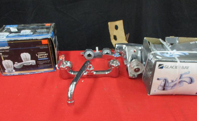 lot 95 image: Faucets Various ones still oin the boxes never used