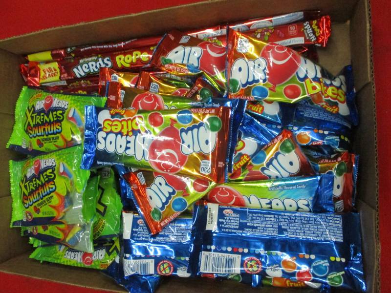 lot 118 image: 35 Packs of airhead, sour candies and more