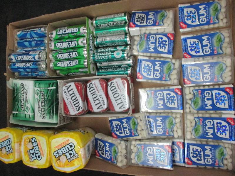 lot 149 image: 62 Packs of gum and mints