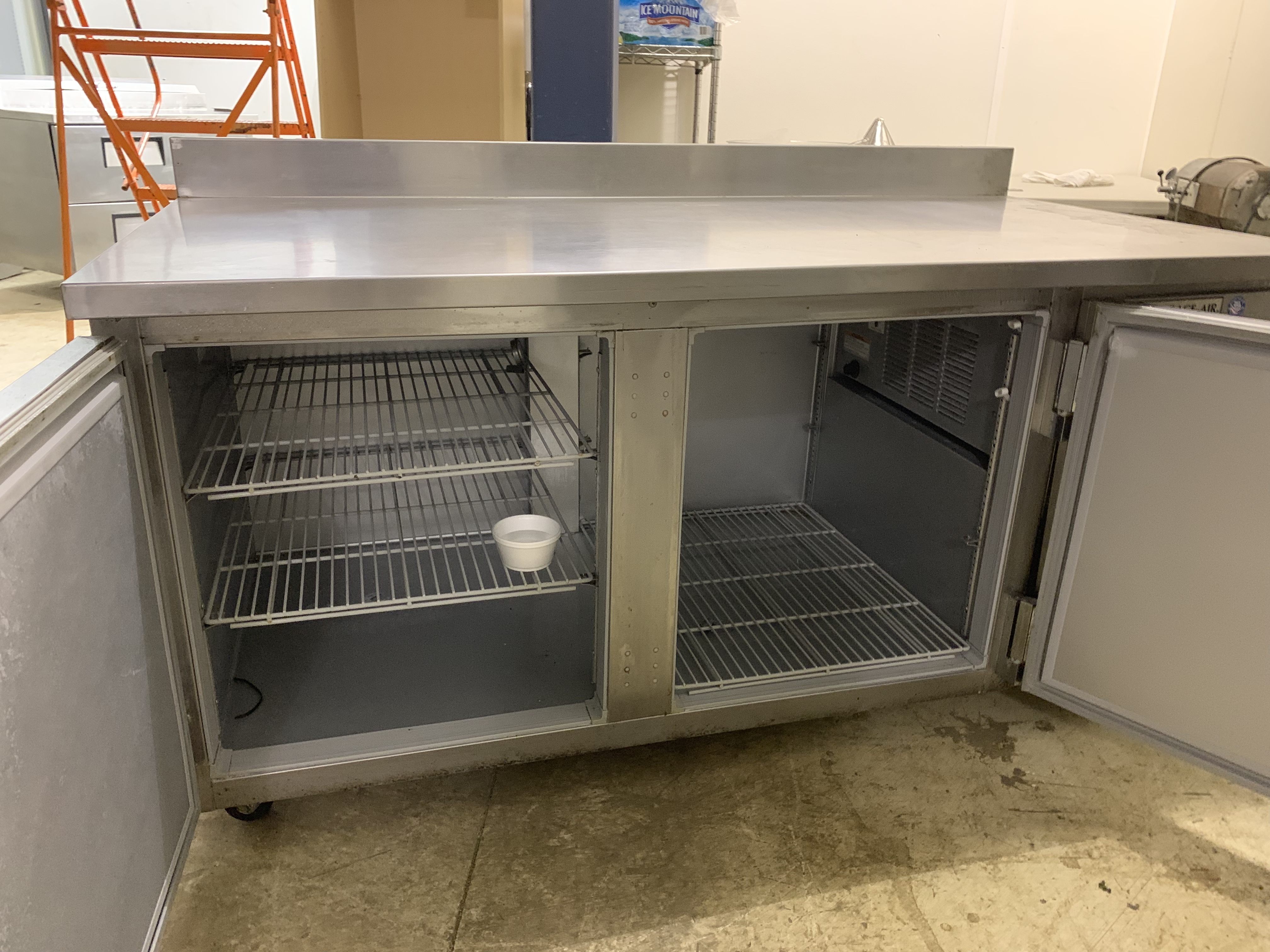 lot 12 image: Beverage Air, Mod #WTF67A-23, work top two door freezer, NSF,  caster mounted, 115 volts, 8.6 amps, Runs Freezes