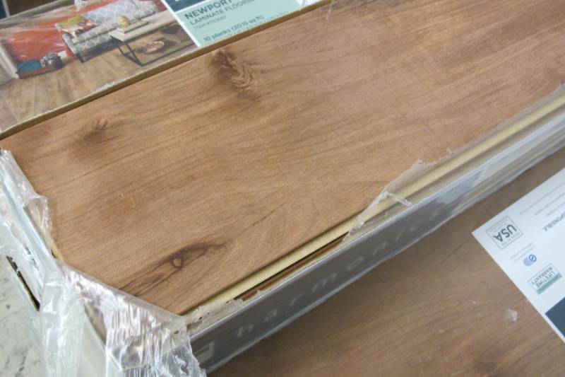 lot F9 image: Lot of Harmonics Spiced Applewood Laminate Flooring - 15 Boxes - Roughly 300 Sq Ft