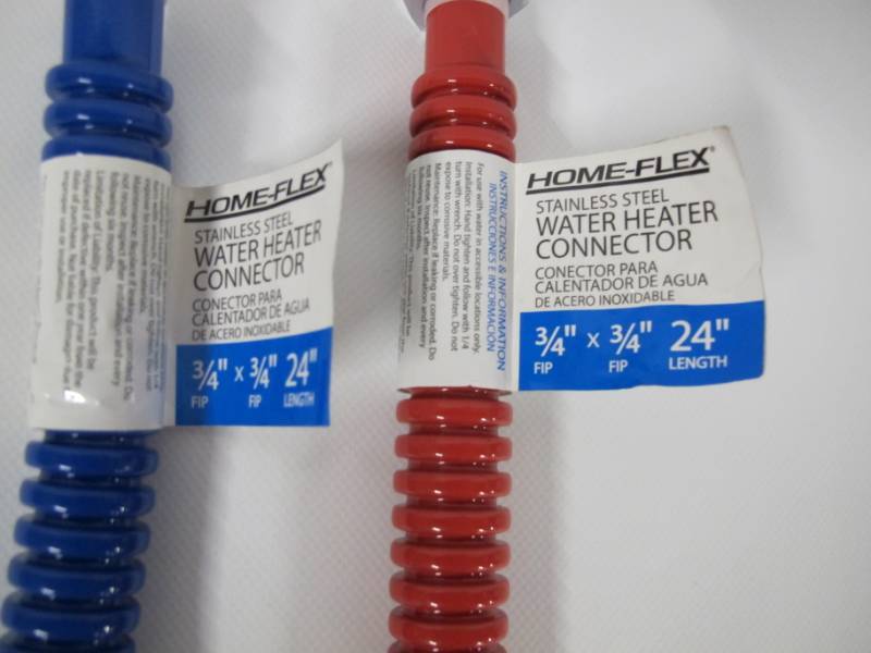 lot 45 image: Pair of HOME-FLEX 34 in. FIP x 34 in. FIP x 24 in. Braided Stainless Steel Water Heater Connector - RED  BLUE