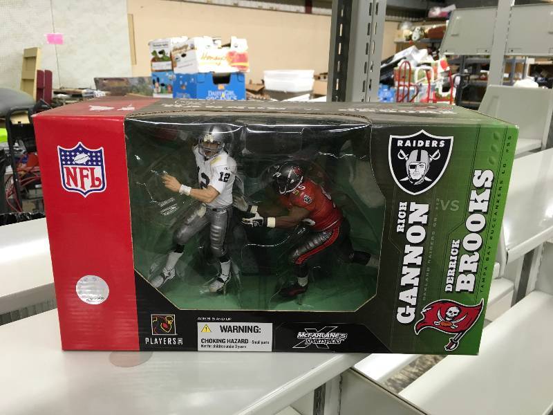 lot 3 image: NFL Rich Gannon V.S. Derrick Brooks Figurines