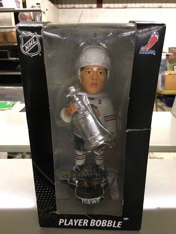lot 7 image: Jonathan Toews Stanley Cup Champion Bobble Head