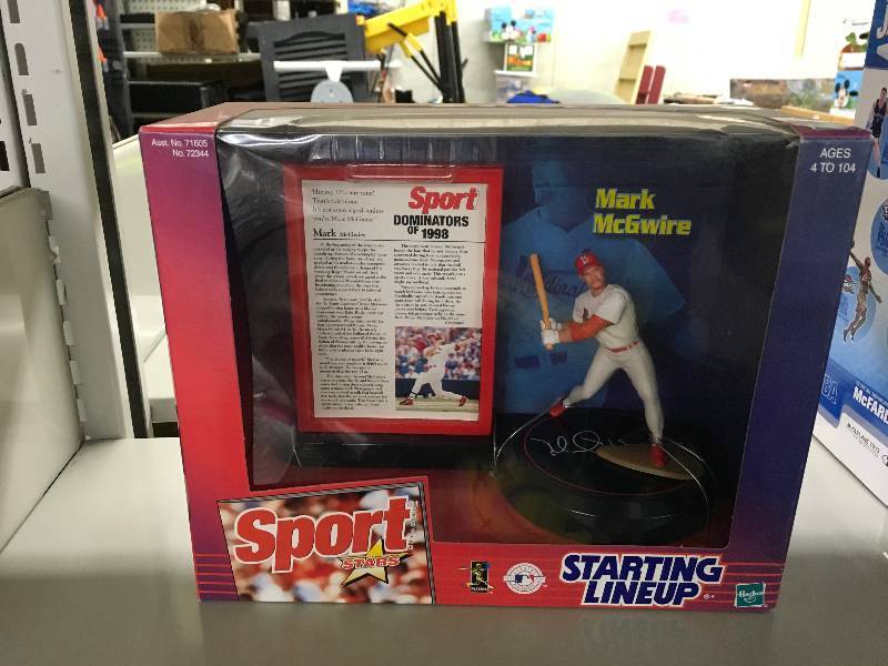 lot 12 image: Starting Lineup Mark McGwire Figurine