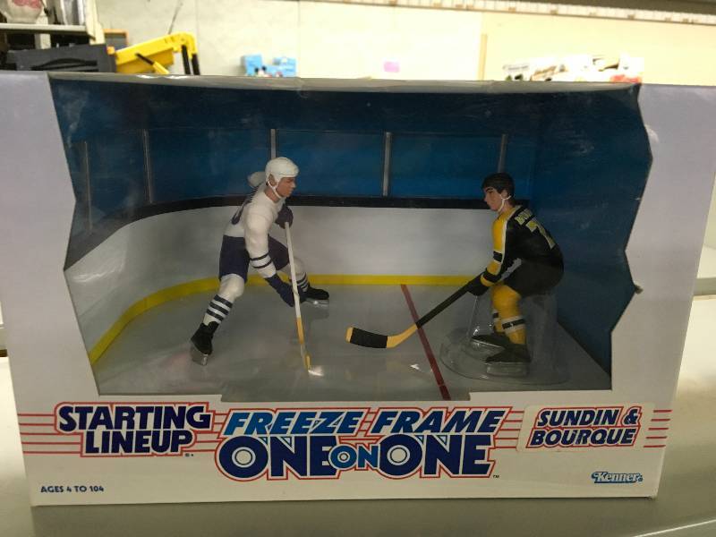 lot 30 image: Starting Lineup Freeze Frame One On One Sundin & Bourque Figurines