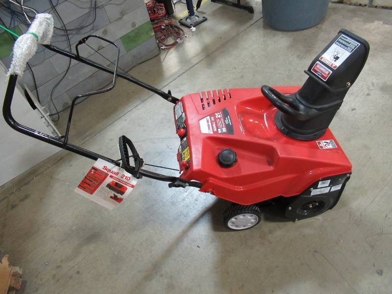 lot 185 image: Troy-Bilt Squall 210 123cc 21-in Single-Stage Pull Start Gas Snow Blower, S2B-210 - NEW - Cracked bracket on shell.