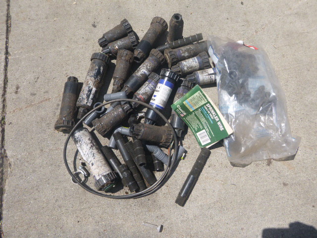 lot 46 image: 16 Used Orbit Pop-Up Sprinkler Heads