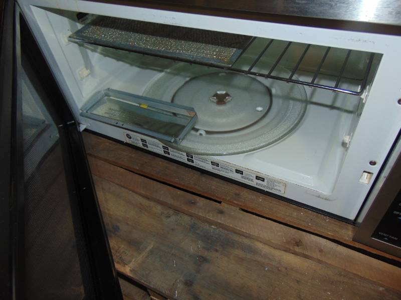 lot 325 image: GE 1.6 cu. ft. Over the Range Microwave Oven in Stainless Steel JVM3160RFSS