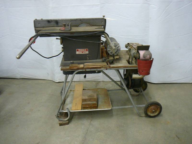 lot 15 image: Toro Table Saw Model 38 With Belt Sander Cart