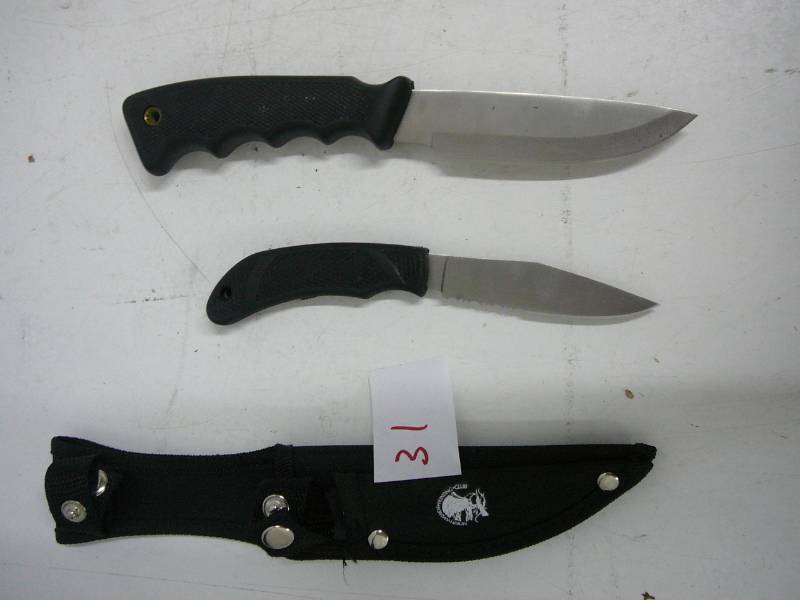 lot 31 image: North American Hunting Club Knife & Sheath