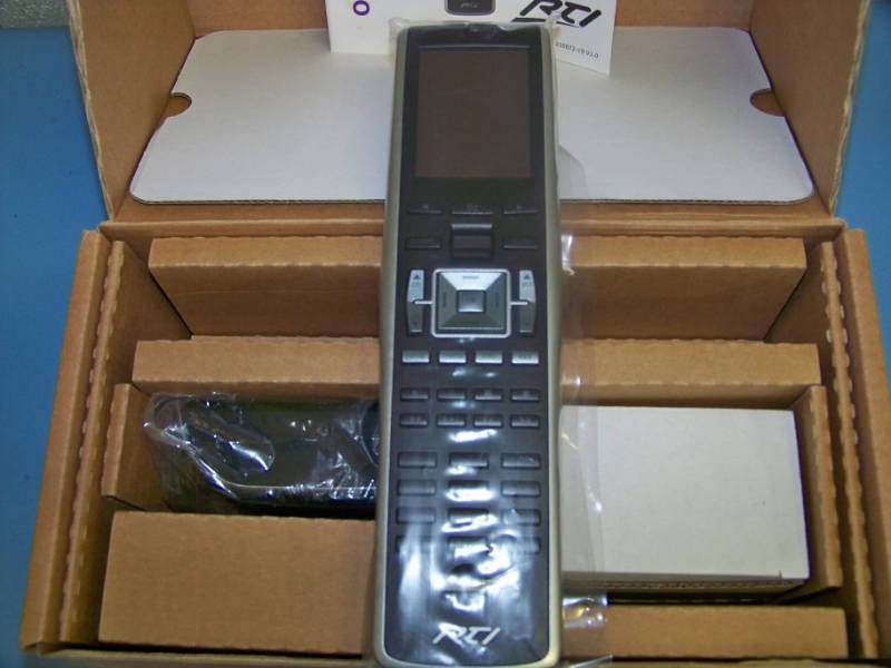 lot 80 image: RTI Corp, T2-C, Universal Remote Control  Controller with Dock - NEW in Original, Open Box
