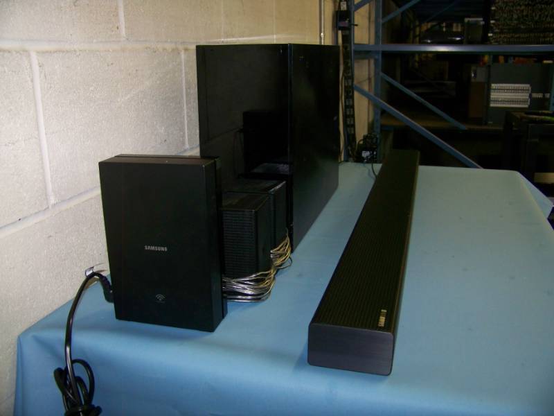 lot 77 image: Samsung, 5.1 Channel, Home TheaterTelevision Audio Soundbar with Wireless Subwoofer  Sub and (2) Satellite Speakers, Bluetooth Connectivity and Remote Control in Original Box