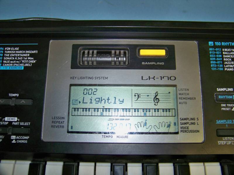 lot 52 image: Casio, LK-170, Electronic, Key Lighting Keyboard and Sound EFX Sampler in Original Box and Stand