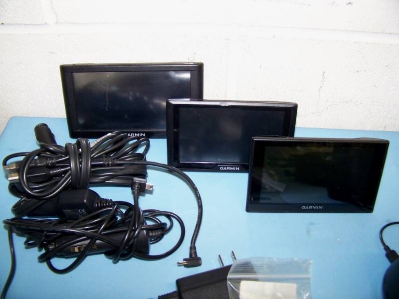 lot 79 image: Miscellaneous lot of Audio  Video Items including Garmin, Linksys, Plantronics, Radio Shack and more