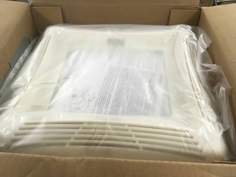 NuTone 50 CFM Ceiling Bathroom Exhaust Fan with Light  in good condition