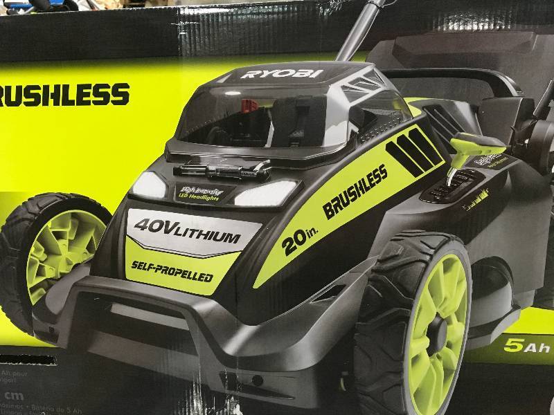 RYOBI 20 in. 40-Volt Brushless Lithium-Ion Cordless Battery Self Propelled Lawn Mower with 5.0 Ah Battery and Charger Included  in good condition
