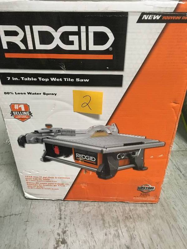 lot 2 image: RIDGID 6.5 Amp Corded 7 in. Table Top Wet Tile Saw USED n good condition