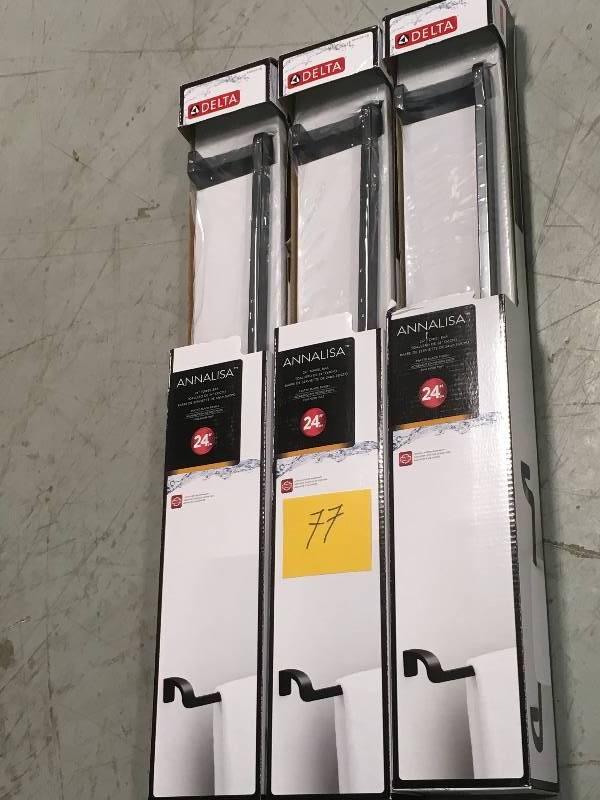 lot 77 image: Delta Annalisa 24 in. Towel Bar in Matte Black in good condition