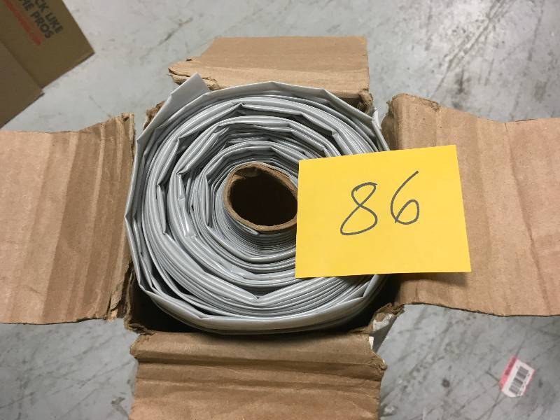 lot 86 image: HUSKY 10 ft. x 50 ft. Clear 6 mil Plastic Sheeting not used