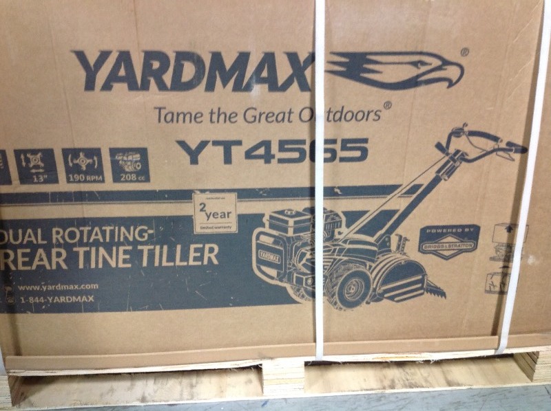 lot 104 image: YARDMAX 18 in. 208cc Dual Rotating Rear Tine Tiller Briggs and Stratton not used