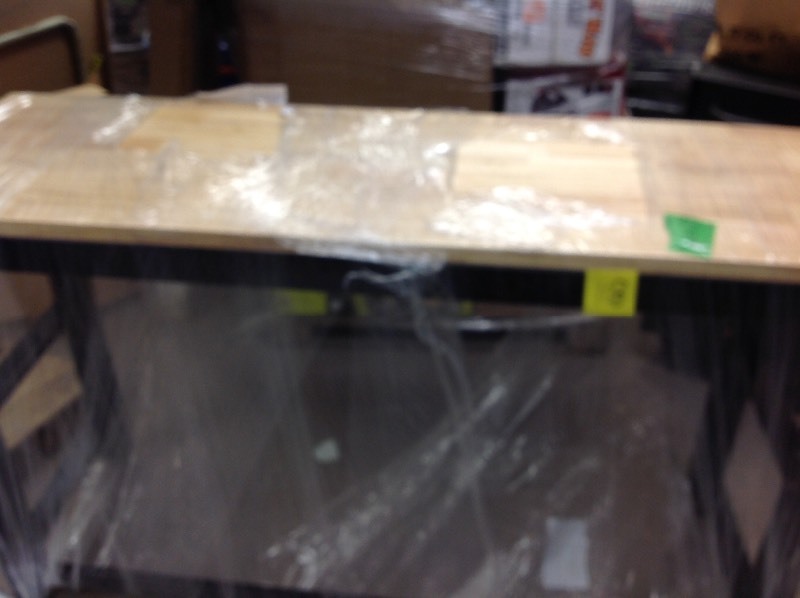 lot 108 image: Husky 6 ft. Solid Wood Top Workbench in working conditions have some scratches on top