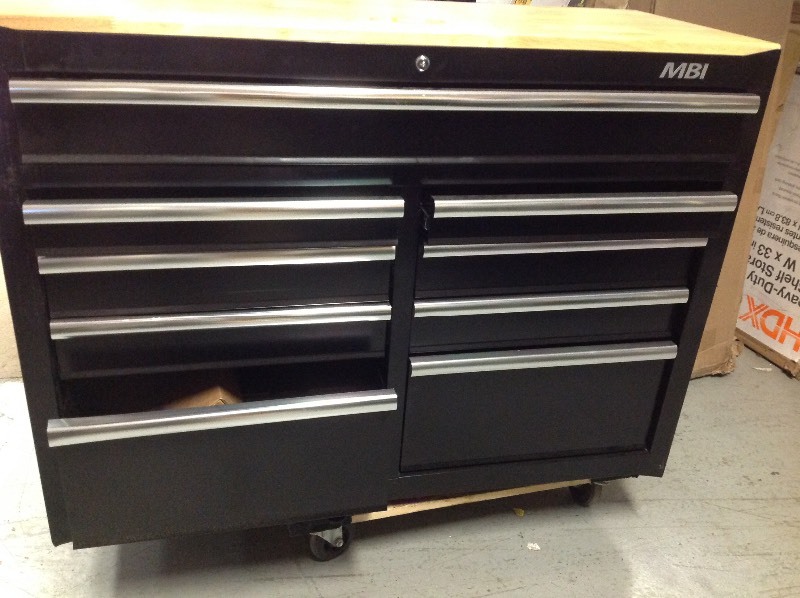 lot 110 image: MBI 46 in. 9-Drawer Center Roller Cabinet Tool Chest in Black damaged side and drawers are locked