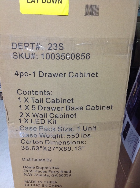 lot 111 image: Husky Heavy Duty Welded 156 in. W x 81 in. H x 24 in. D Steel Garage Cabinet Set in Black (8-Piece) large cabinets have some damage please review pictures as stock photo was used to display item retails for $$2300