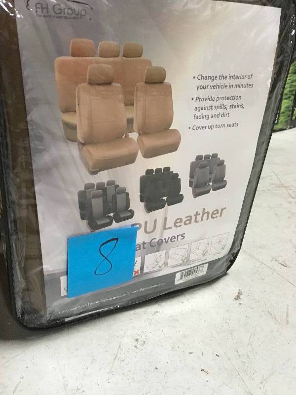 lot 8 image: FH Group Premium PU Leather 15 in. x 12 in. x 6 in. Full Set Seat Covers not used