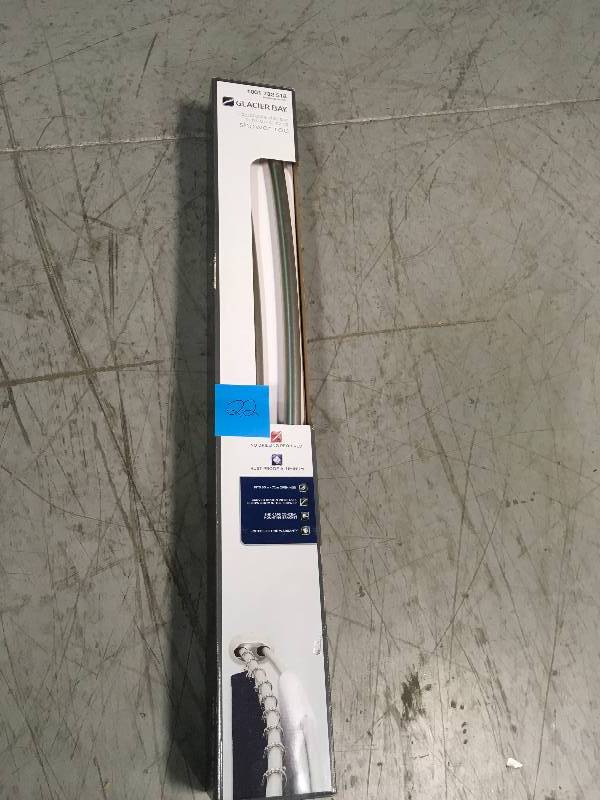 lot 22 image: Glacier Bay Rustproof 50 in. to 72 in. Aluminum Adjustable Tension Double Curved Shower Rod in Brushed Nickel in good condition