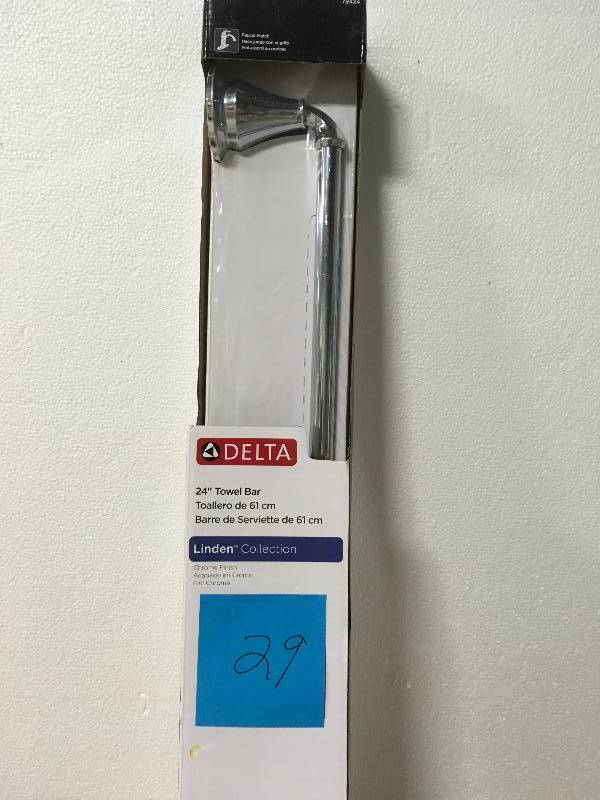 lot 29 image: Delta Linden 24 in. Towel Bar in Chrome in good condition
