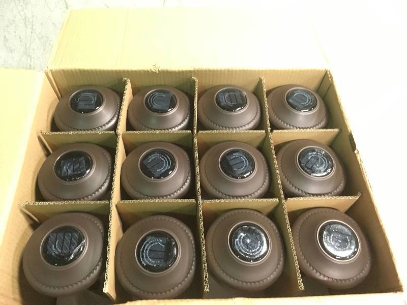 lot 63 image: Hampton Bay Open Stock Solar Bronze Outdoor Integrated LED Landscape Path Light with Ribbed Glass Lens CASE 12 PK in good condition