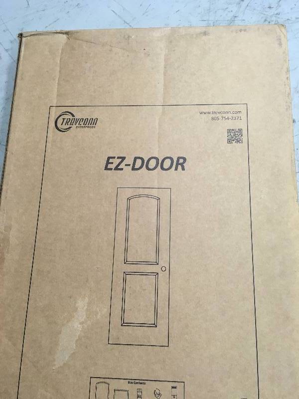 lot 65 image: EZ-Door 28 in., 30 in. and 32 in. Width Interior Door Self-Adhering Decorative Frame Kit in good condition