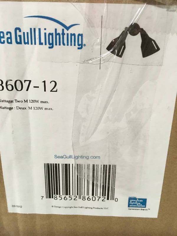lot 89 image: Sea Gull Lighting 2-Light Black Outdoor Piedmont Swivel Flood Light with Adjustable Heads in good condition