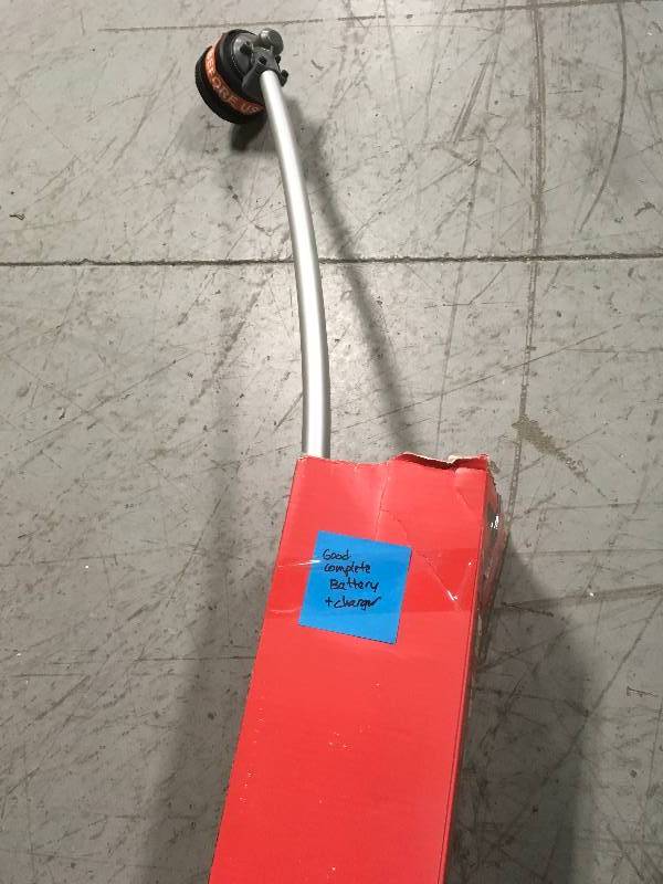 lot 99 image: Milwaukee M18 FUEL 18-Volt Lithium-Ion Brushless Cordless String Trimmer (Tool Only) in good condition whit small dent