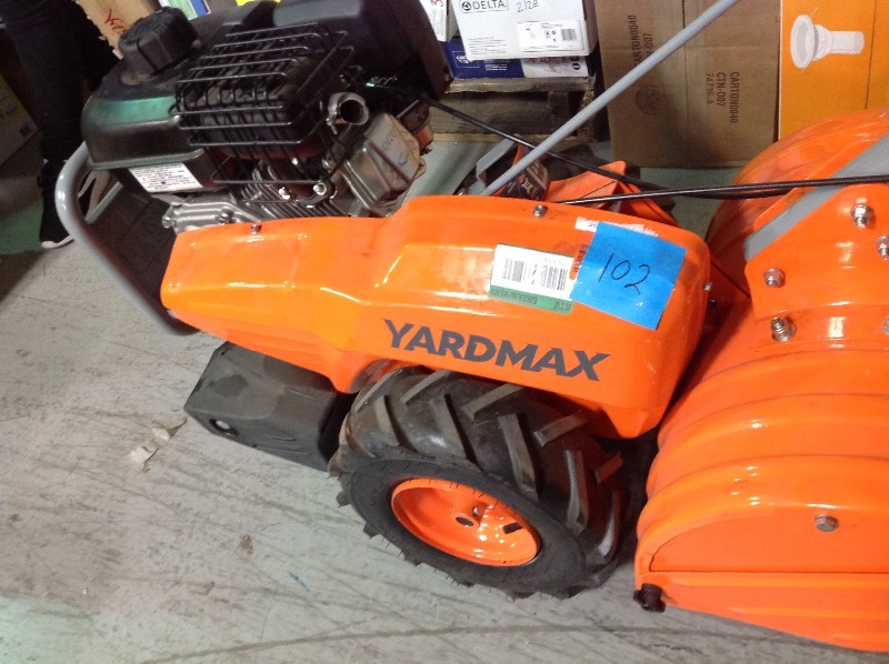 lot 102 image: YARDMAX 18 in. 208cc Dual Rotating Rear Tine Tiller Briggs and Stratton in good conditions