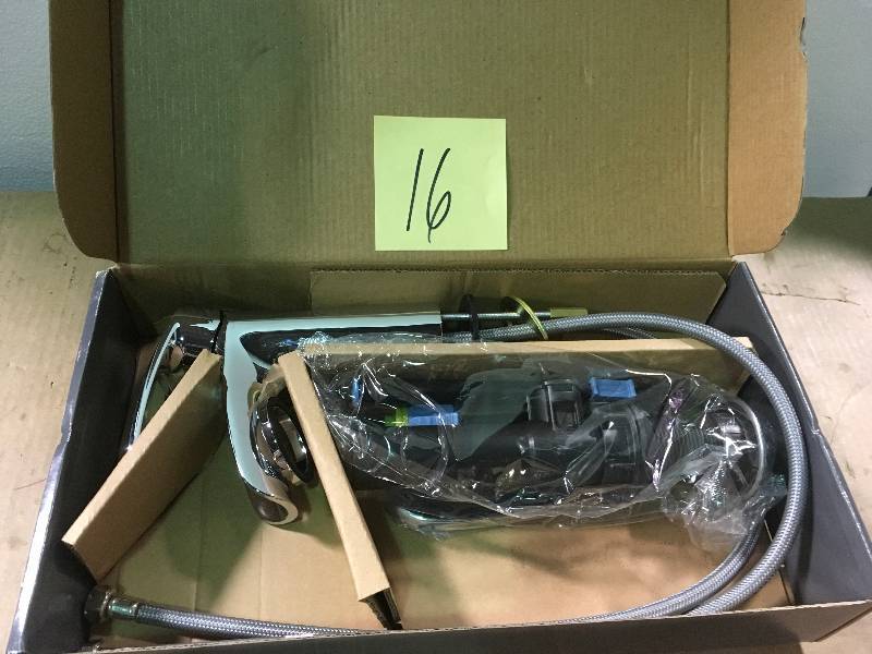 lot 16 image: Kiso Single Hole Single-Handle Low-Arc Bathroom Faucet in Chrome by Glacier Bay in good condition