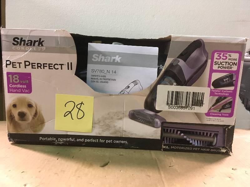 lot 28 image: Shark Pet Perfect II Cordless Handheld Vacuum in good condition