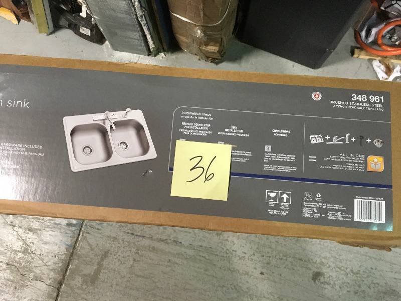lot 36 image: All-in-One Drop-In Stainless Steel 33 in. 4-Hole Double Bowl Kitchen Sink by Glacier Bay in good condition