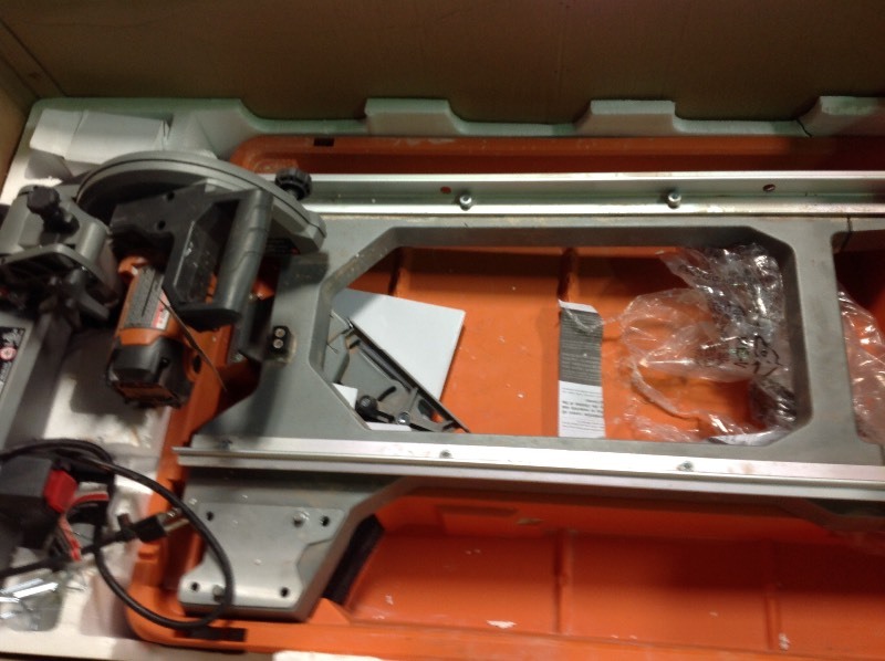 lot 106 image: Ridgid 12 Amp Corded 8 in. Wet Tile Saw with Stand used in good condition