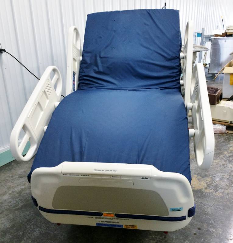 lot 29 image: GIVE YOUR LOVED ONE THE BEST Stryker Secure II WITH ZOOM Power Motorized Adjustable 500lb Capacity Hospital In-Home Health Patient Care Bed Built In Weight Scale &amp Bed-Exit Alarm Plugs Into Regular Light Socket Free Used High Quality Mattress