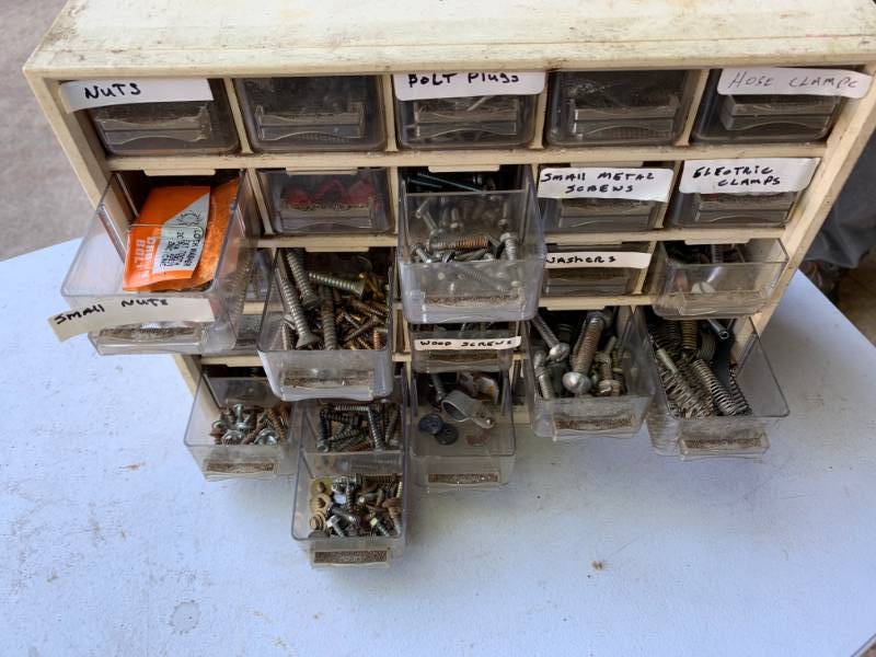 lot 98 image: Hardware Storage Container with Hardware Included