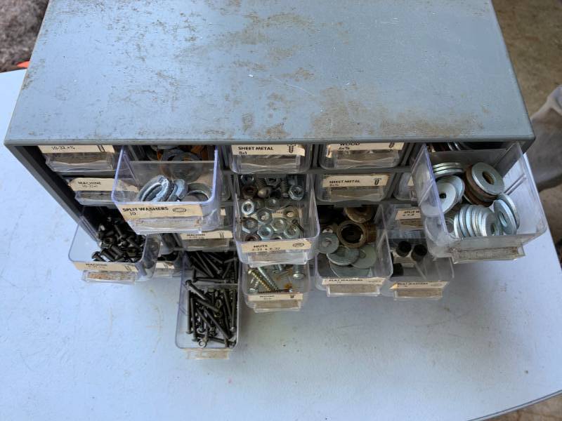 lot 101 image: Hardware Storage Container with Hardware Included