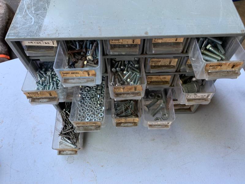 lot 102 image: Hardware Storage Container with Hardware Included