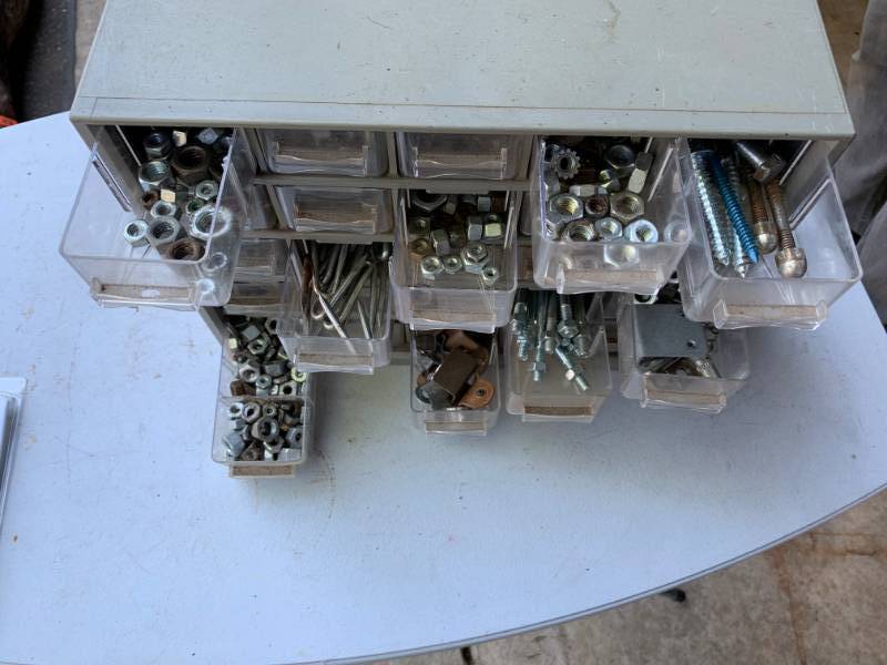 lot 103 image: Hardware Storage Container with Hardware Included